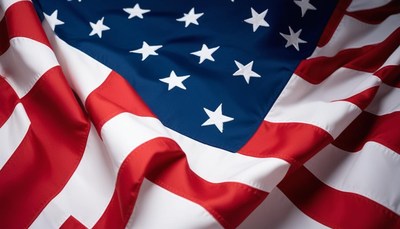 A close-up of an american flag waving in the wind