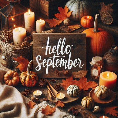 Hello september, a cozy scene with pumpkins and candles