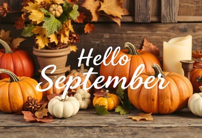 Pumpkins and fall leaves welcome september