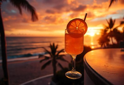 A cocktail at sunset overlooking the ocean