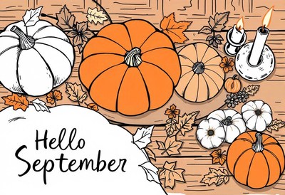 Pumpkins and candles on a wooden table for a cozy september