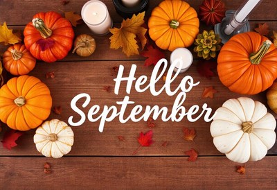 Pumpkins and fall leaves welcome september