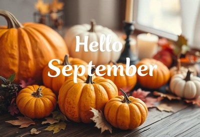 Pumpkins and leaves welcome september