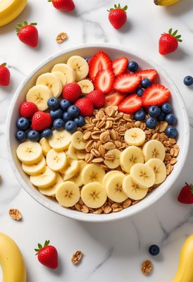 A bowl of cereal, banana, strawberries, and blueberries
