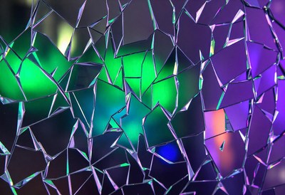 Broken mirror reflects colorful lights