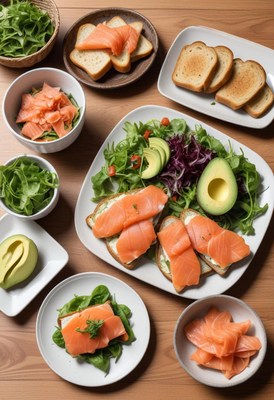 A spread of salmon, avocado, and salad for lunch