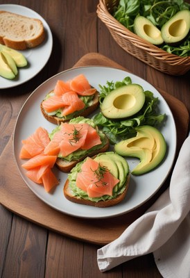 Three salmon and avocado toast on a plate