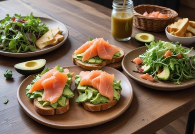 Avocado toast with salmon and salad: three plates