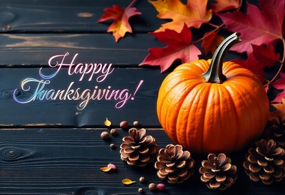 Happy thanksgiving! a pumpkin sits on a wooden table
