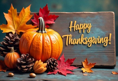 A happy thanksgiving sign with pumpkins and fall leaves