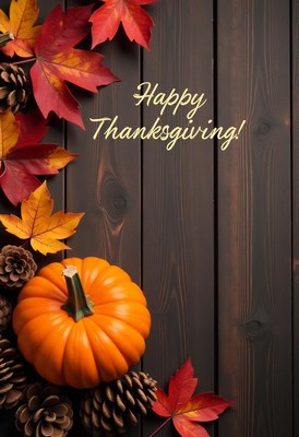 Happy thanksgiving! pumpkin on table with leaves
