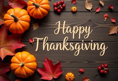 Happy thanksgiving with pumpkins and fall leaves