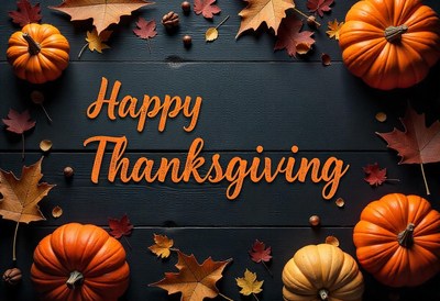 Happy thanksgiving with pumpkins on wood table
