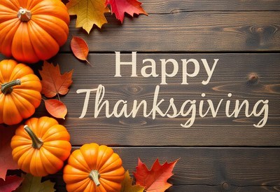 Thanksgiving with pumpkins and leaves on a table