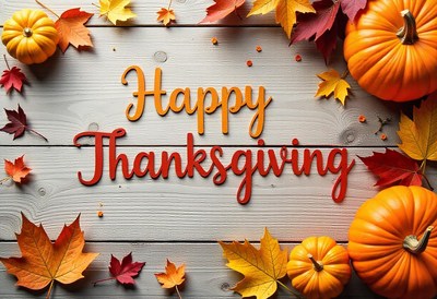 Happy thanksgiving with pumpkins and fall leaves