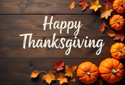 Thanksgiving pumpkins on rustic wood background