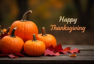 Happy thanksgiving with pumpkins and leaves