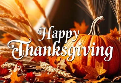 Happy thanksgiving with a pumpkin and autumn leaves