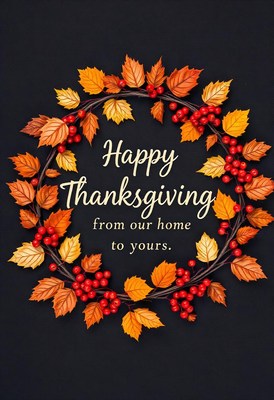 A thanksgiving wreath with fall leaves and red berries