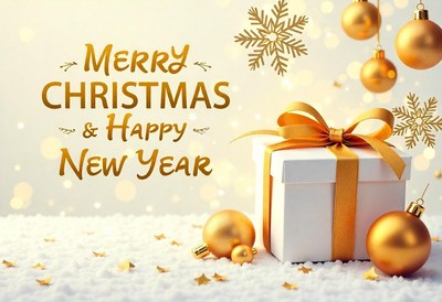 White gift box with gold ribbon on snow