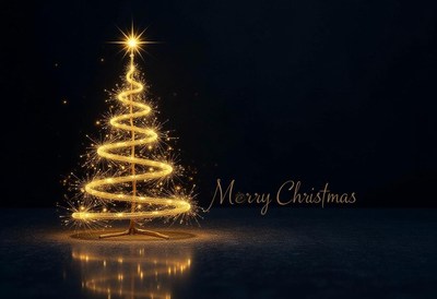 A sparkling christmas tree glows in the dark