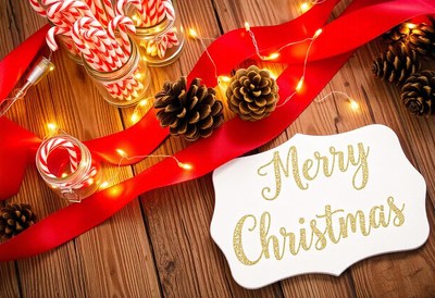 Festive table with candy canes and merry christmas sign