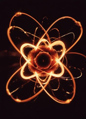 A glowing orange light creates an abstract atom shape