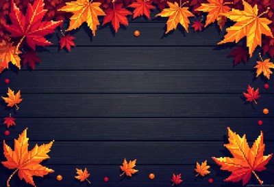 Autumn leaves frame a dark wooden background