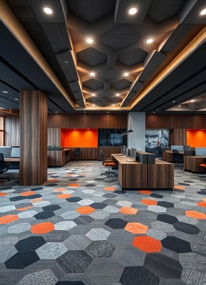 A modern office with a geometric patterned floor