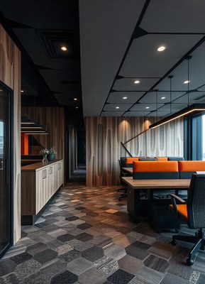 A modern office space features a geometric tile floor