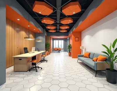 An office lobby with a desk and chairs, a couch, and a plant