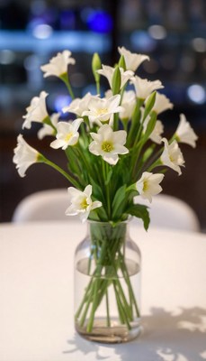 White flowers in a vase on a table