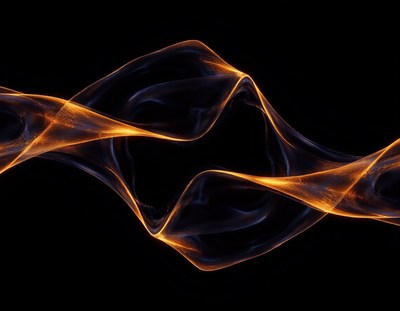 Golden light waves on a black background