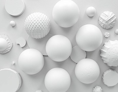 White spheres and textured objects on a white background
