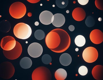 Red and white bokeh circles on a black background