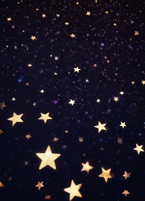 Golden stars shine brightly against a dark blue sky