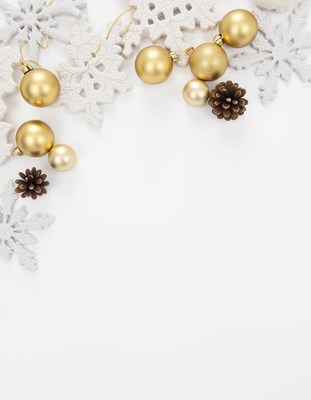 Gold ornaments and snowflakes on a white background