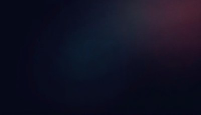 A dark blue background with a hint of pink