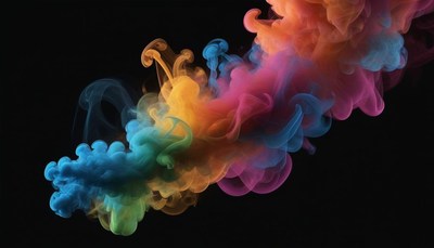Colorful ink swirls in a dark studio