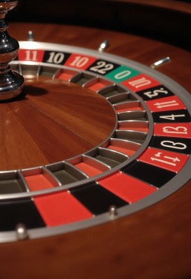 A close-up view of a roulette wheel in a casino
