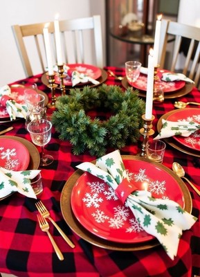 Festive red and black tablecloth with snowflake plates