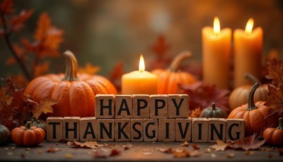 Happy thanksgiving with pumpkins and candles