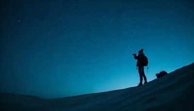 Adventure under the night sky in a snowy landscape