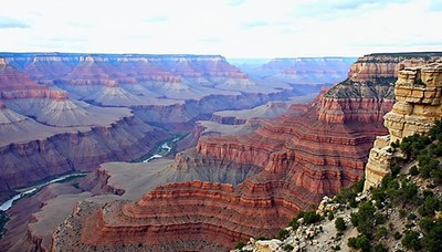 Majestic view of the grand canyon under cloudy sky