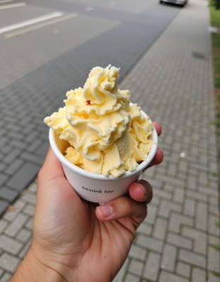 Delicious soft serve ice cream on a city sidewalk