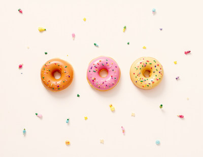 Three Colorful Sprinkled Donuts