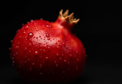 Red Pomegranate with Water Droplets