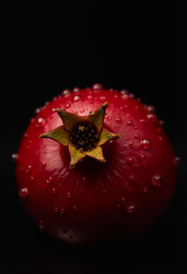 Closeup of dewy red pomegranate