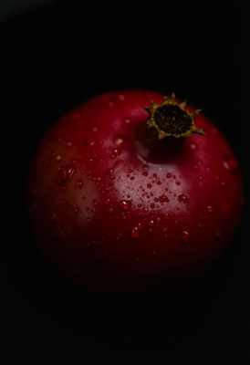 Red Pomegranate with Water Droplets