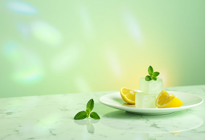 Refreshing dessert with lemon and mint on marble table